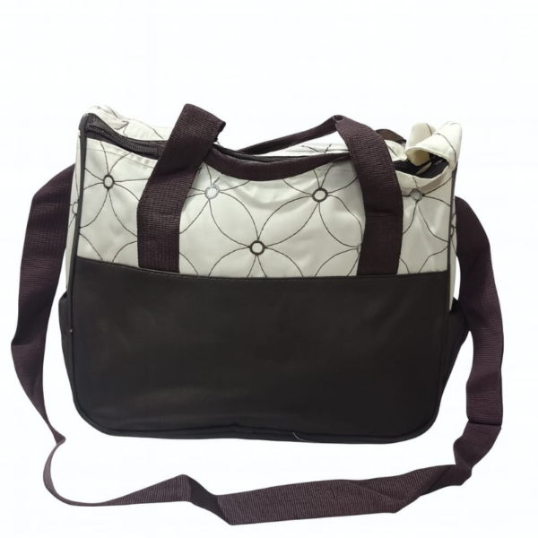 Hafta bazaar by “Brown and cream classic small mommy diaper shoulder bag with compact design and organized compartments.”