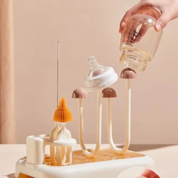 Hafta Bazaar by “Drain rack with cleaning brush used for drying baby bottles, cups, and feeding accessories.”