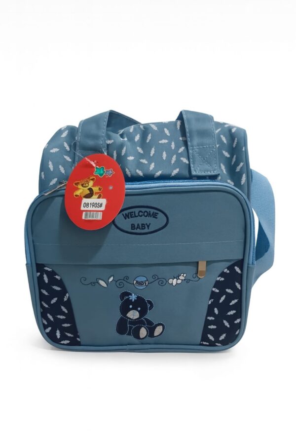 Hafta Bazaar by “Welcome Baby pink small diaper bag with cute teddy embroidery, ideal for carrying baby essentials.”